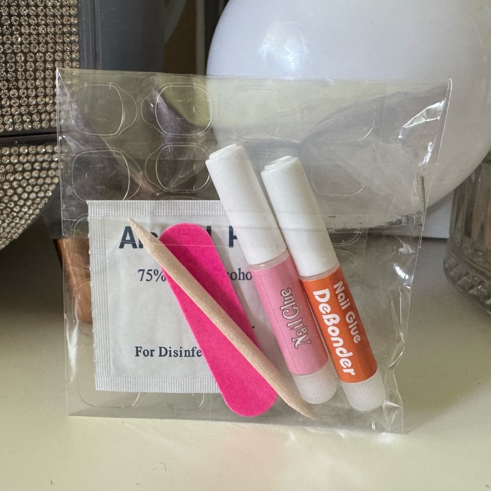 3/$15 Press-On Nail Application Set (Glue, DeBonder, Cuticle Stick, and More)